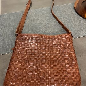 Woven brown Vilencia crossbody bag and wallet.